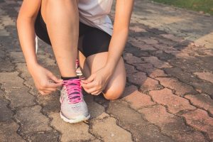 person-tying-shoes-1