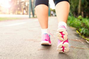 legs of a running woman